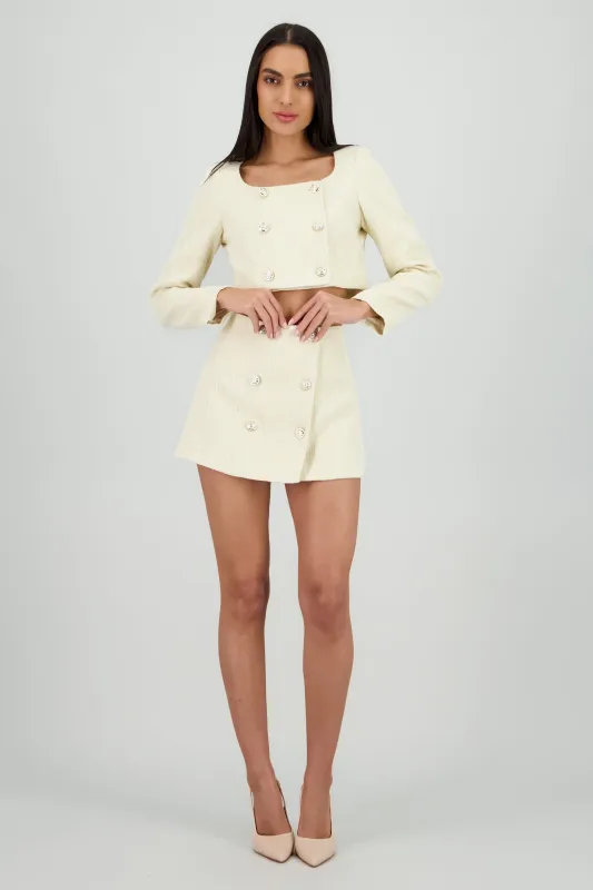 Mini falda tweed detalle botones sold by Shasa