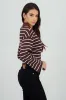 Sueter tejido cuello polo rayas sold by Shasa