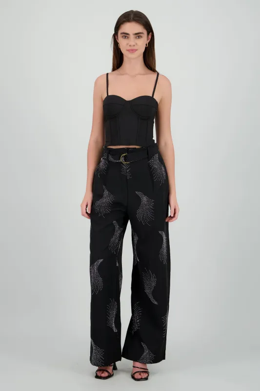 Pantalon amplio detalle brillos sold by Shasa