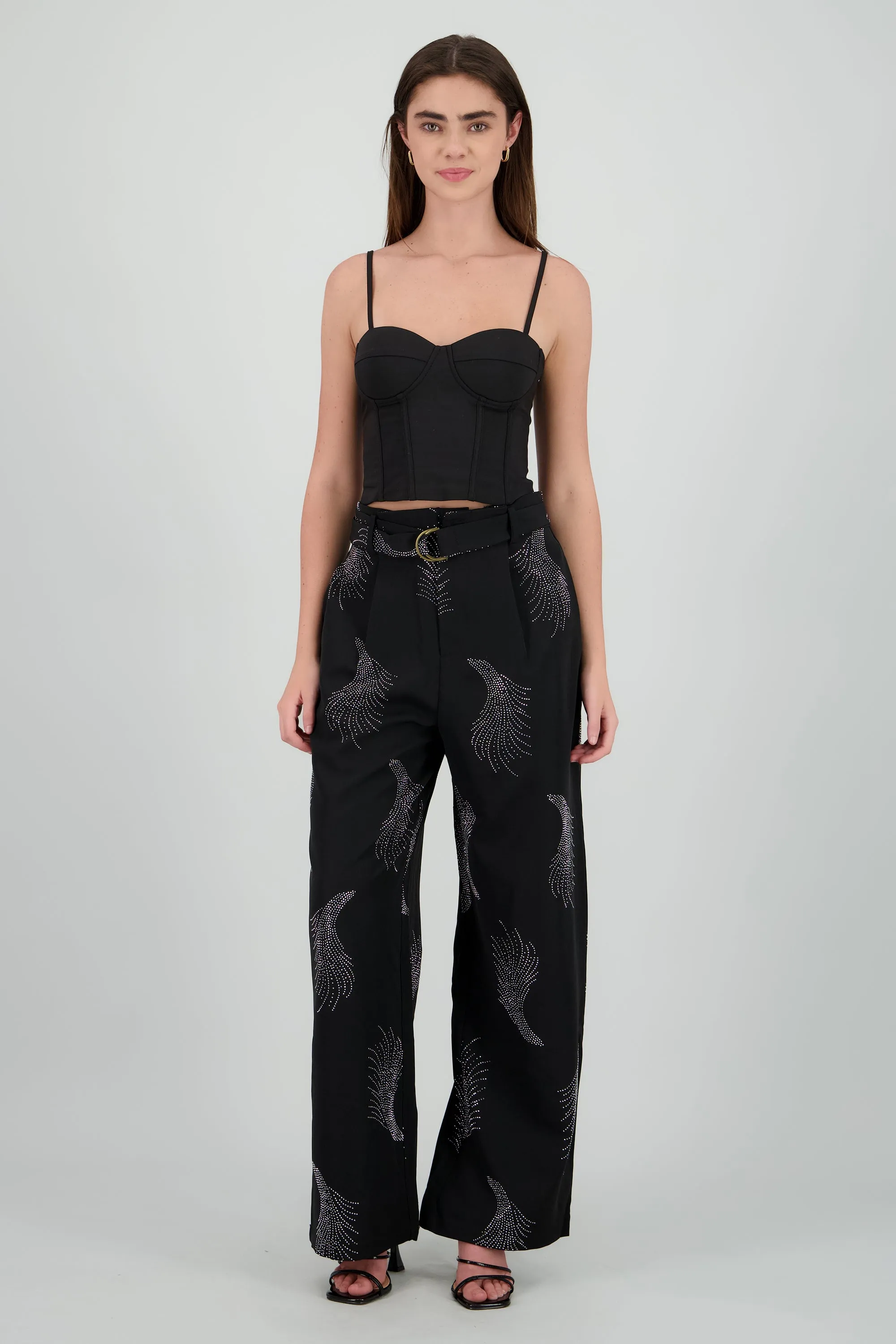 Pantalon amplio detalle brillos sold by Shasa