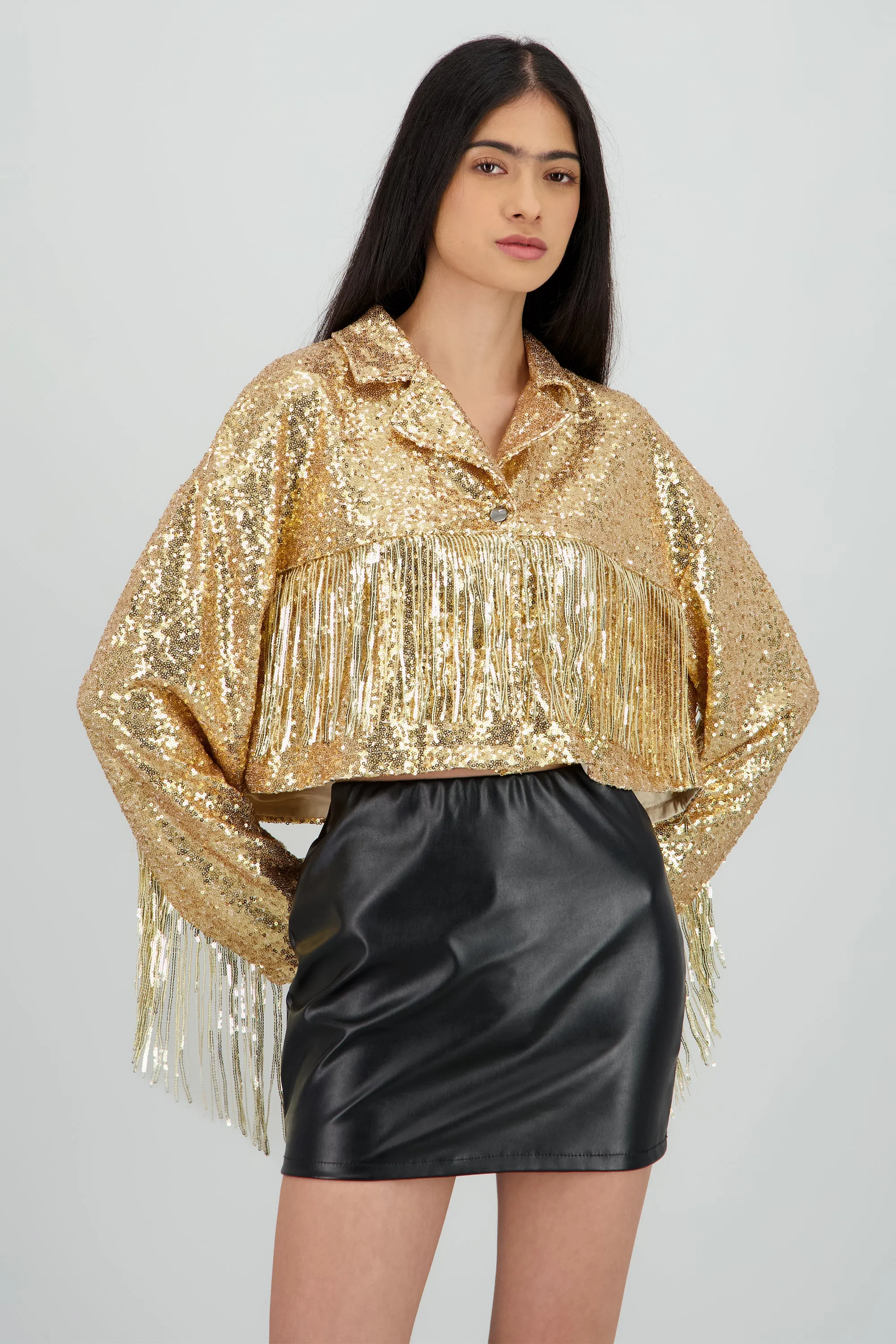 Chamarra crop fringe con brillos sold by Shasa