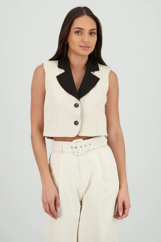 Chaleco cruzado con 2 botones contraste sold by Shasa