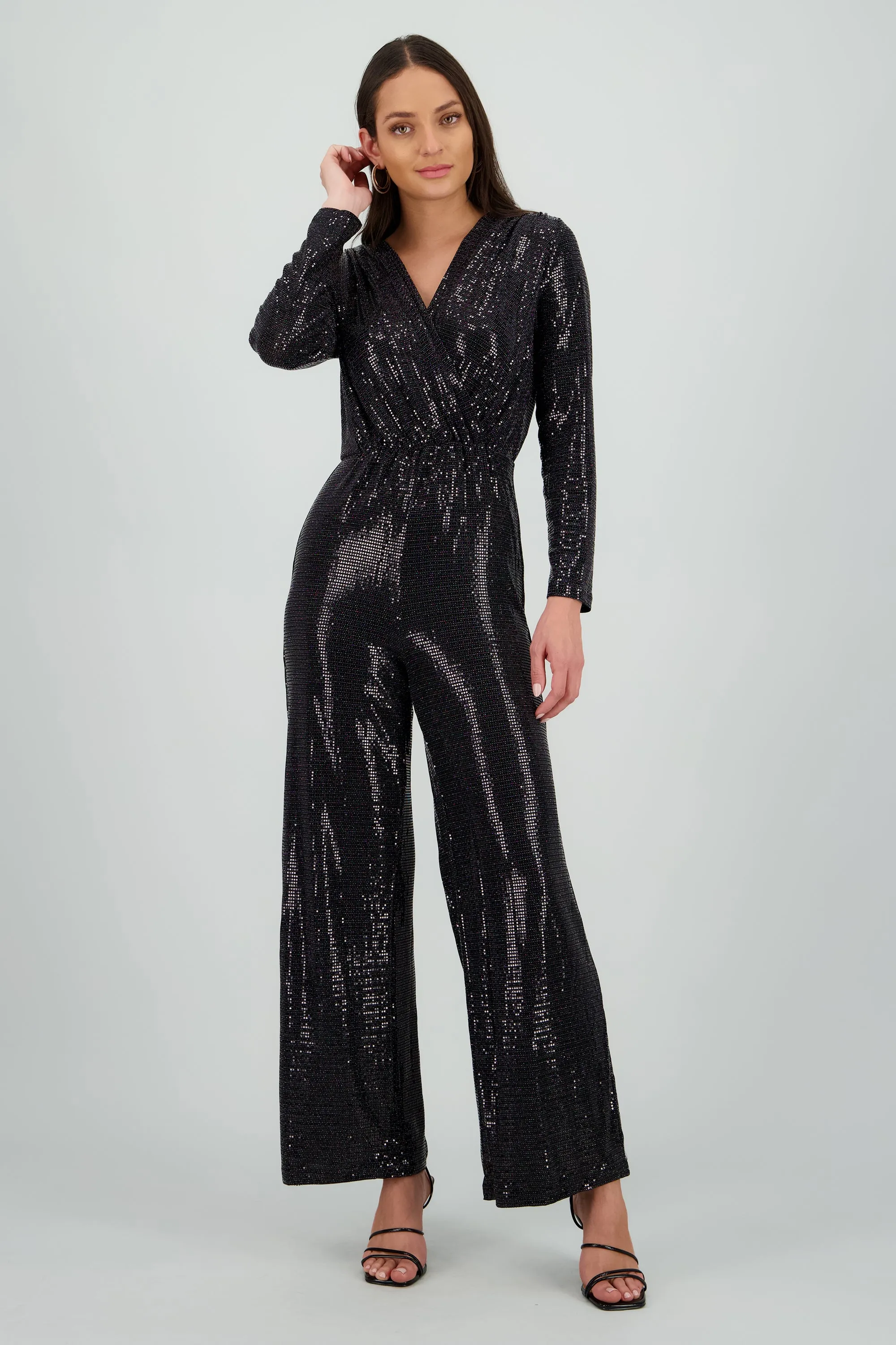 Jumpsuit manga larga con brillos sold by Shasa