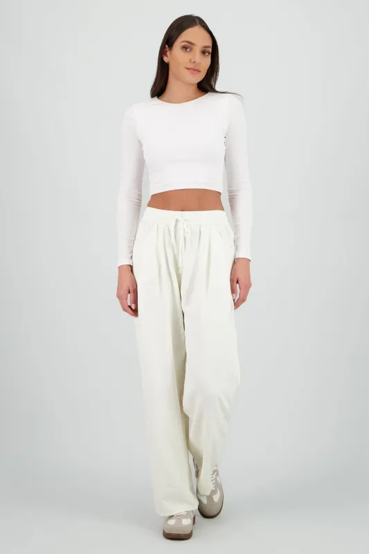 Pantalon jareta con bolsas sold by Shasa