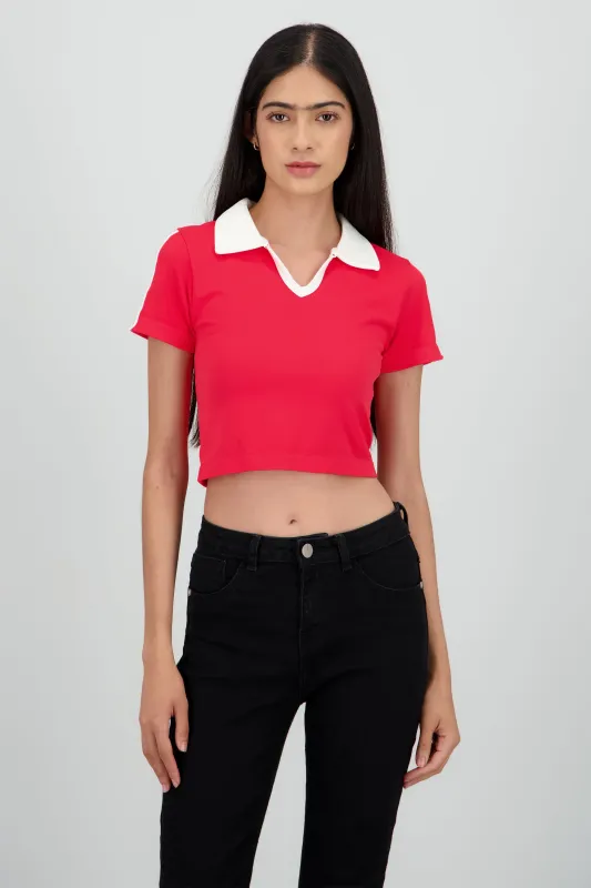 Top cuello polo lineas contraste sold by Shasa