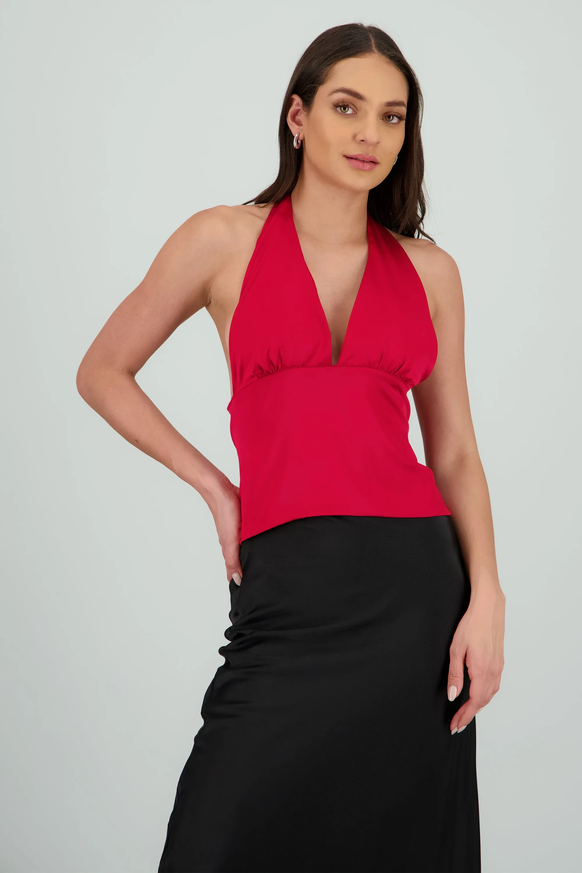 Top satinado escote espalda sold by Shasa