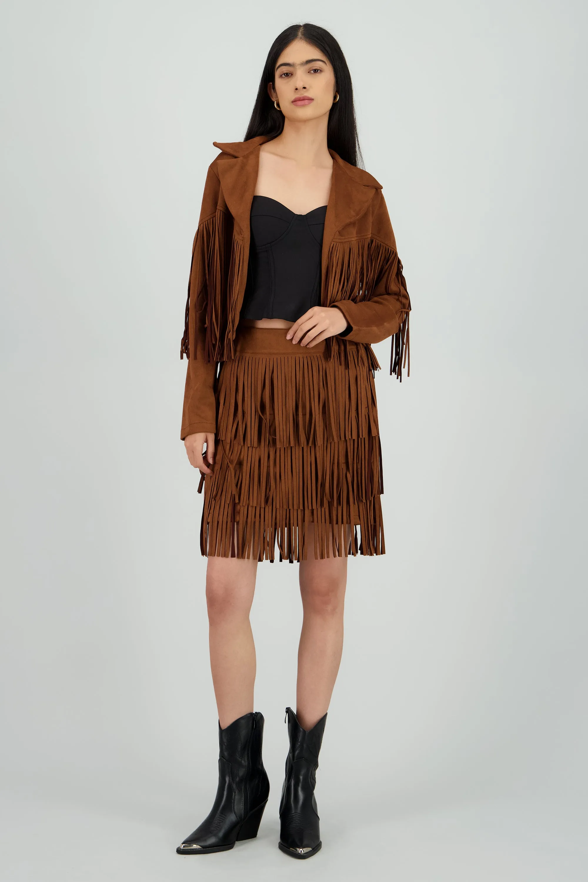 Falda mini detalle fringe suede sold by Shasa