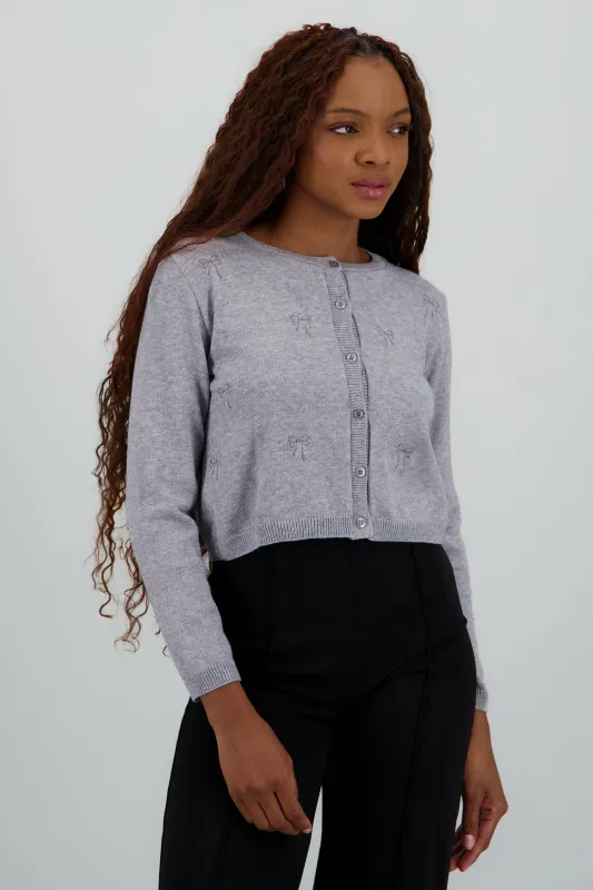 Cardigan detalle de bordado moños sold by Shasa