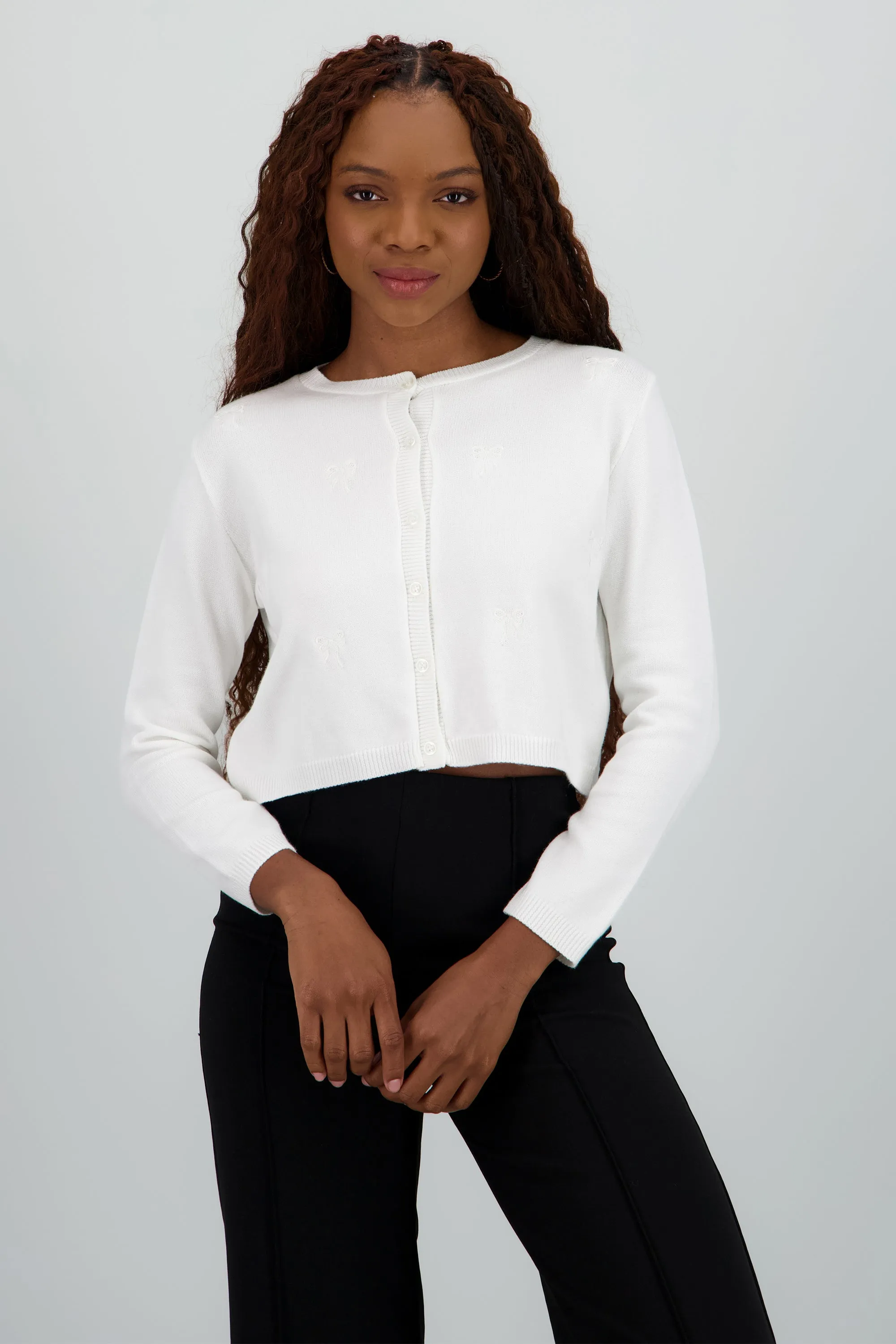 Cardigan detalle de bordado moños sold by Shasa