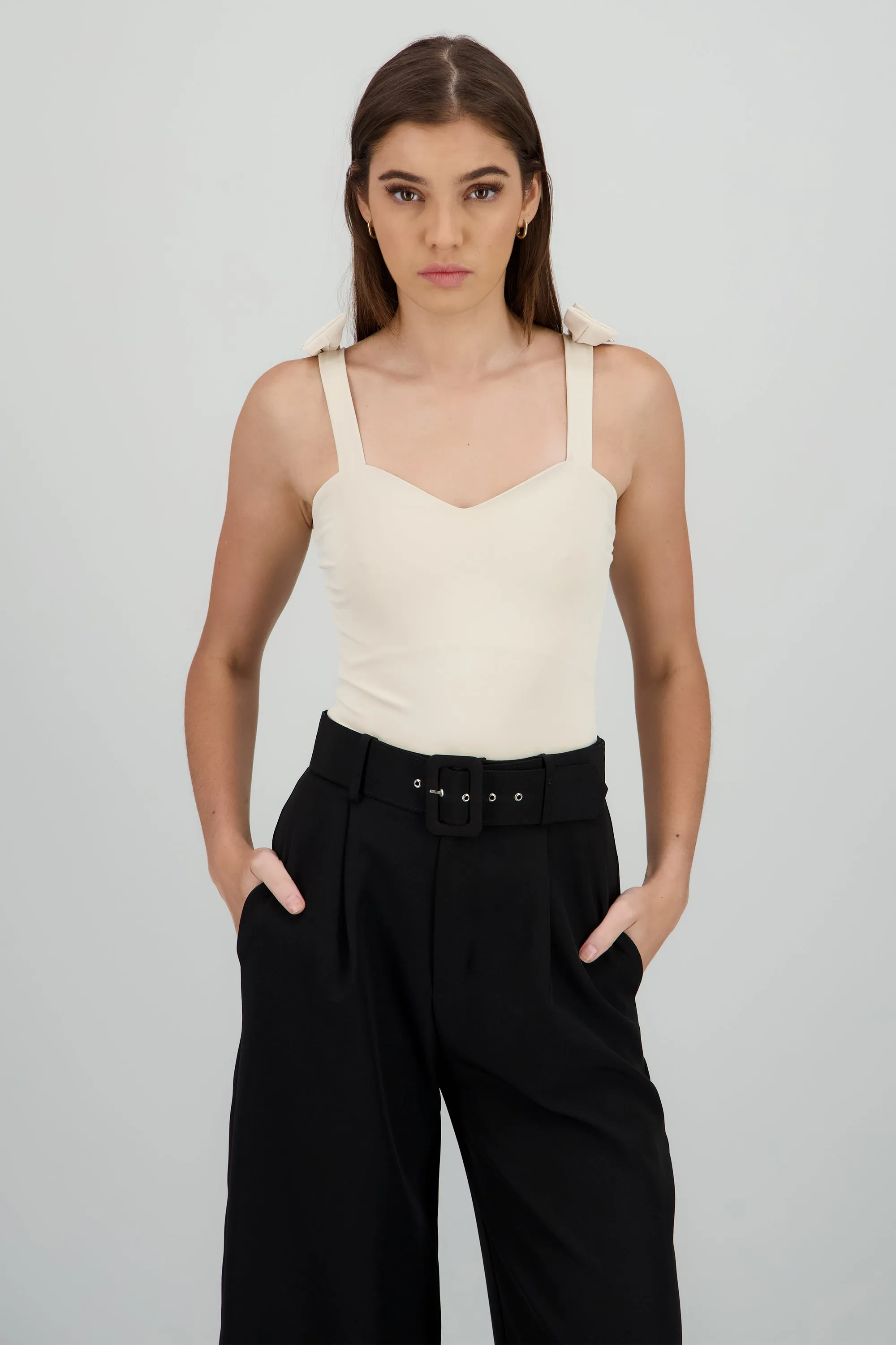 Bodysuit Liso Con Tirante Moños Hypsters sold by Shasa