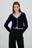 Cardigan botones detalle contraste sold by Shasa