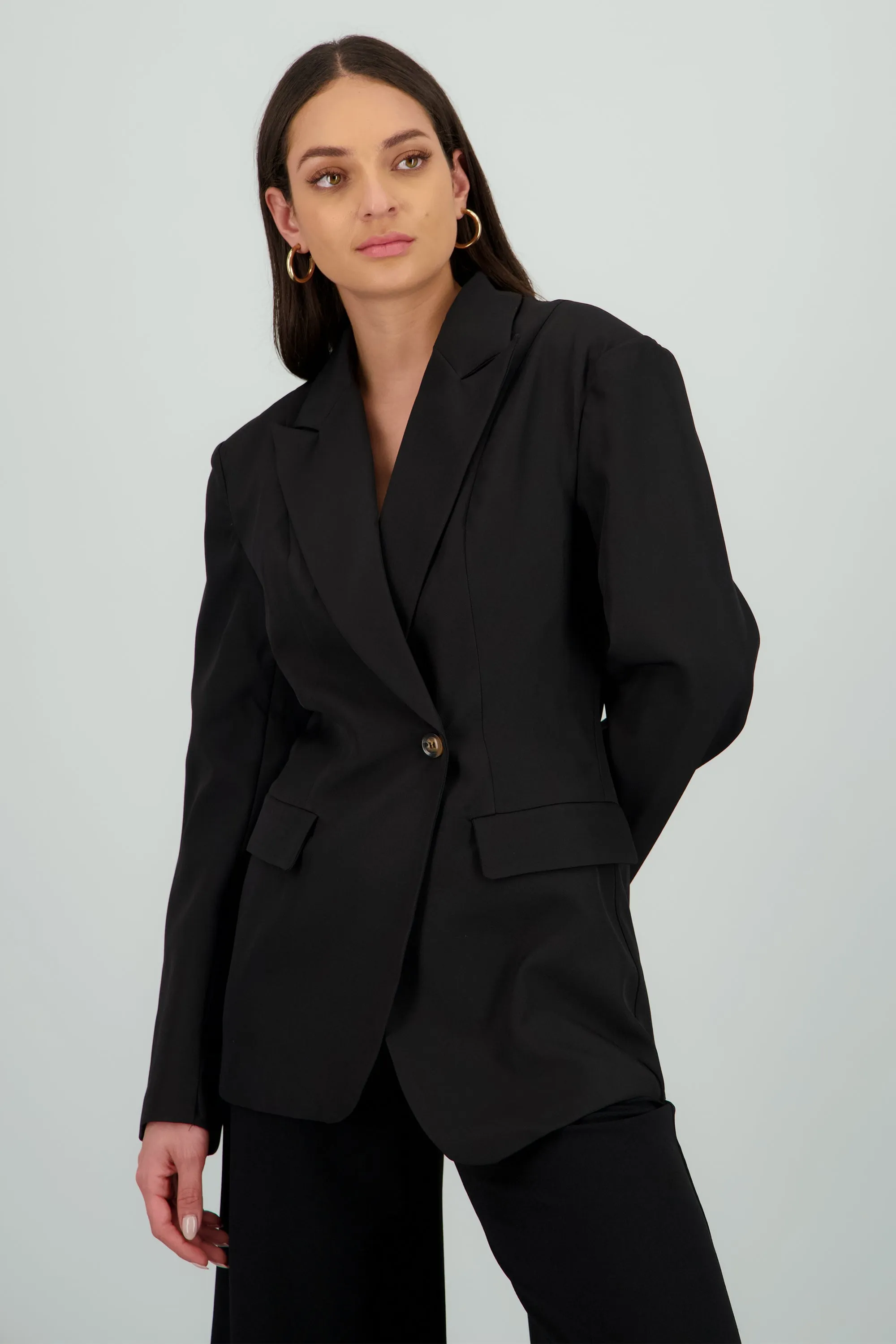 Saco corte asimetrrico sold by Shasa