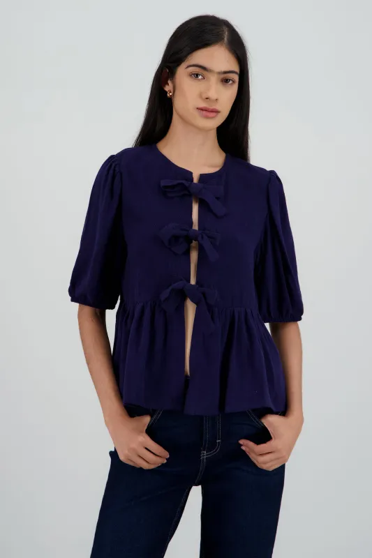 Blusa manga abullonada con moños sold by Shasa