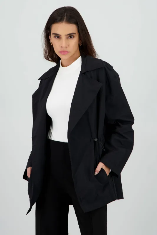 Gabardina lisa detalle amarre costados sold by Shasa