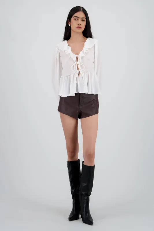 Mini short high waisted efecto piel sold by Shasa