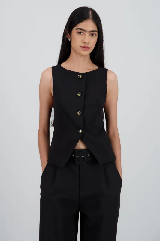 Chaleco botones cuello redondo sold by Shasa