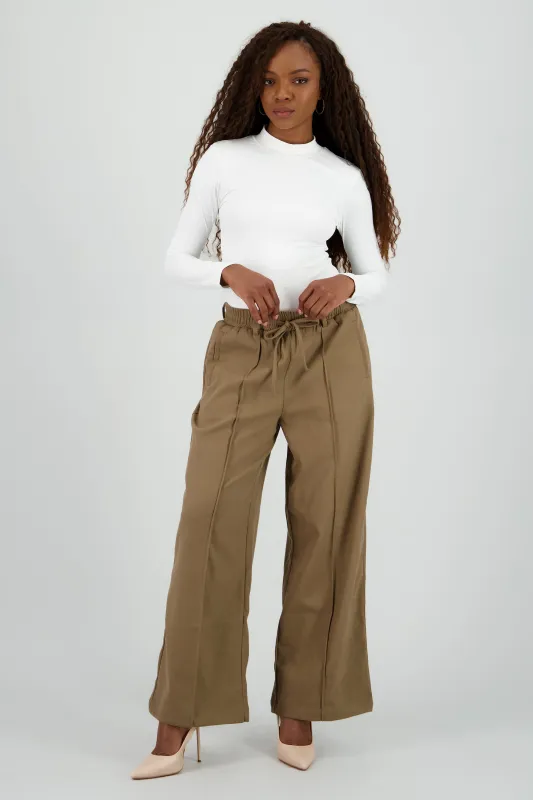 Pantalon amplio liso detalle resorte sold by Shasa