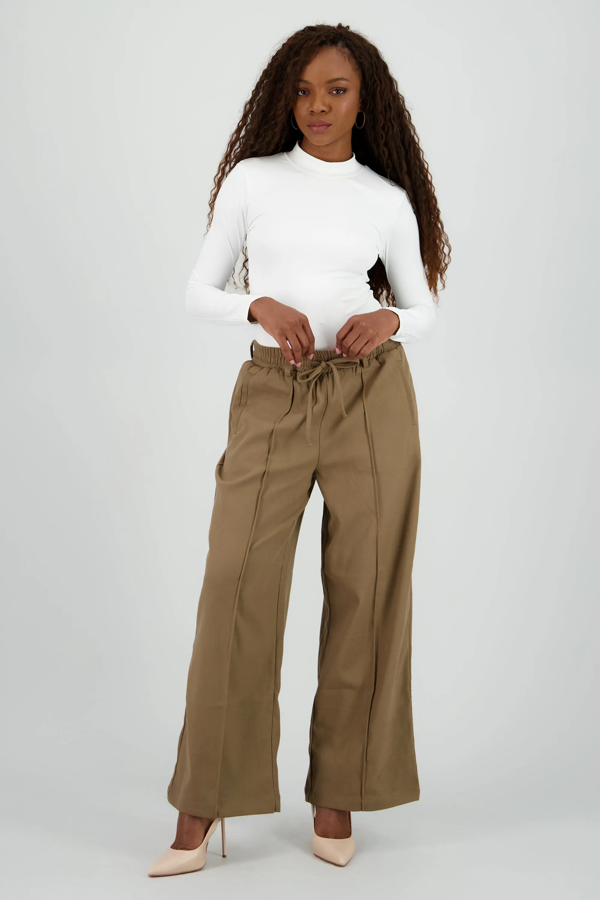 Pantalon amplio liso detalle resorte sold by Shasa