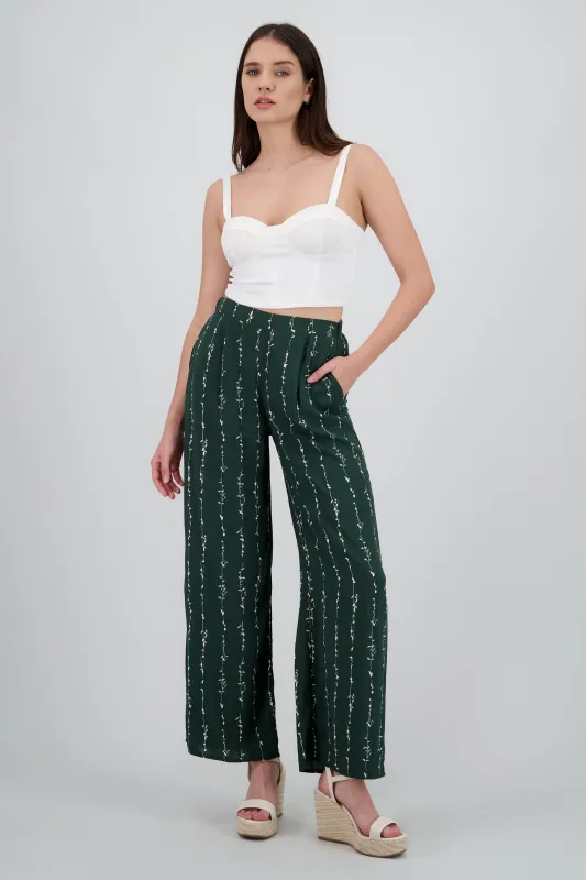 Pantalon recto con estampado flores sold by Shasa