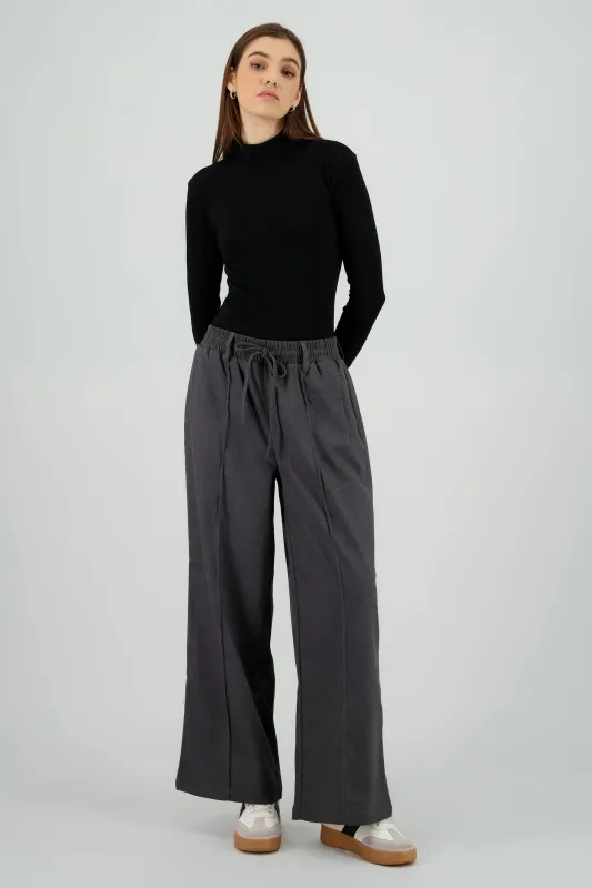 Pantalon amplio liso detalle resorte sold by Shasa