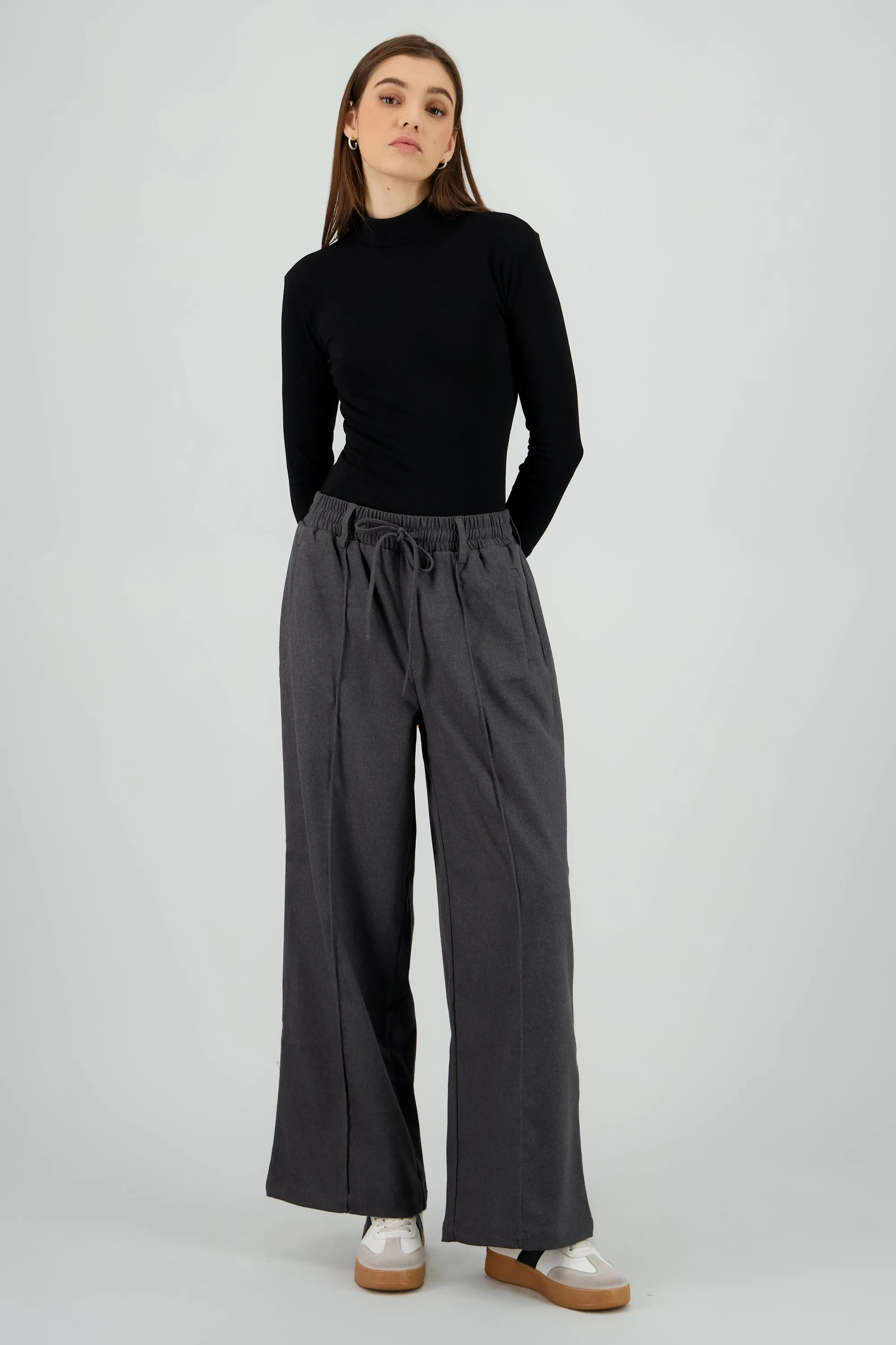 Pantalon amplio liso detalle resorte sold by Shasa