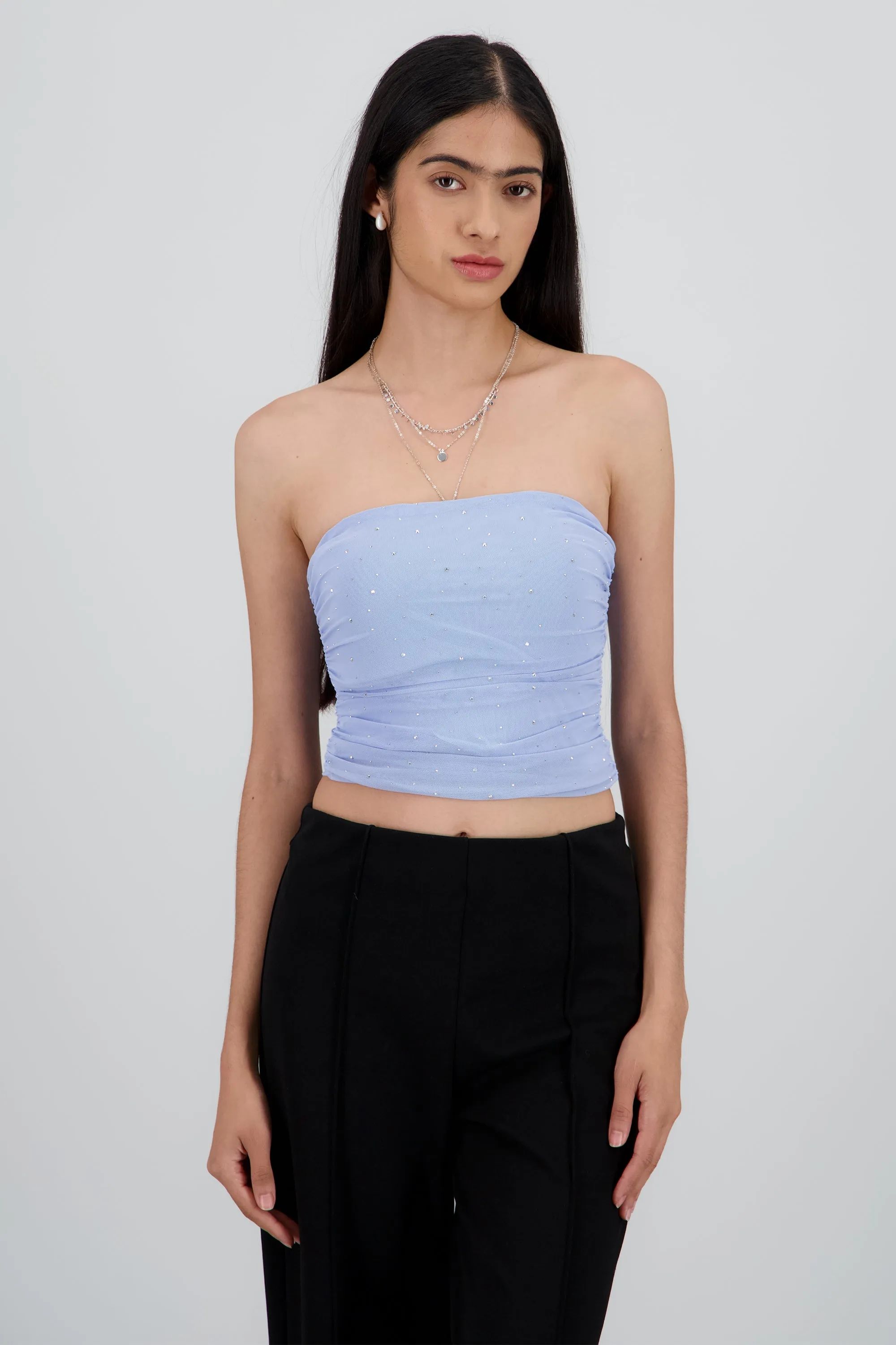 Top tubo de mesh con tela de brillos sold by Shasa