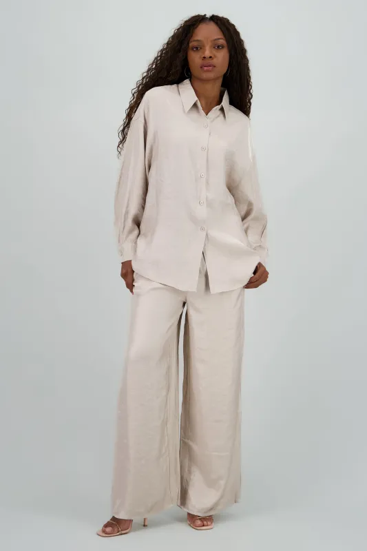 Pantalon amplio fluido detalle satinado sold by Shasa