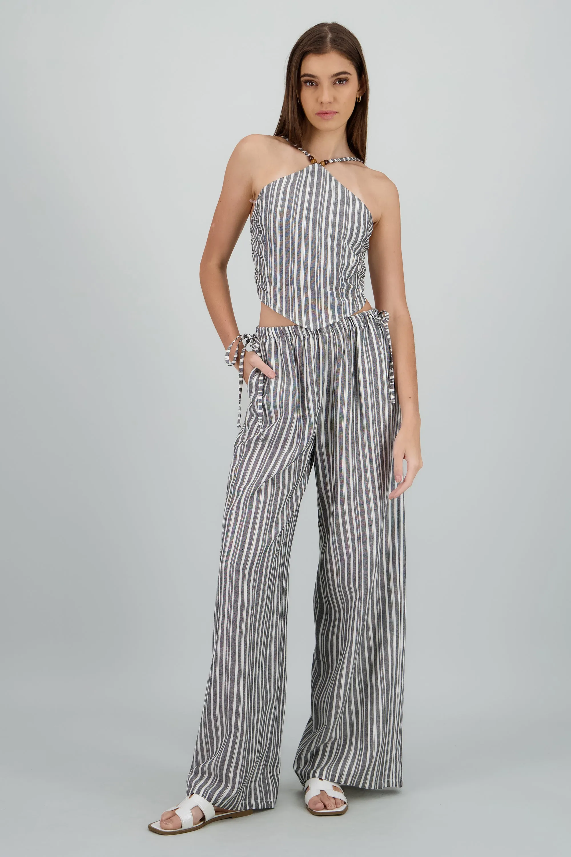 Pantalon amplio jareta lineas sold by Shasa