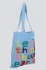 Bolsa tote lets think about sold by Shasa