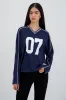 Playera tipo jersey contraste manga larga sold by Shasa