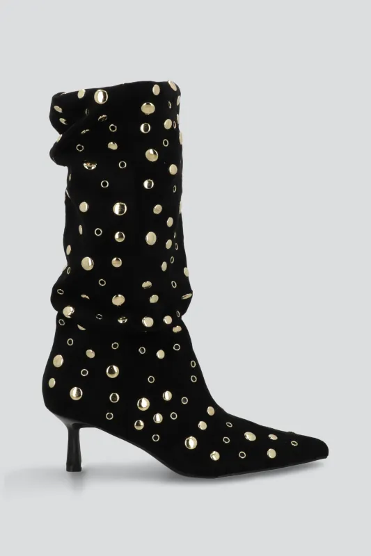 Bota slouchy eyelets sold by Shasa