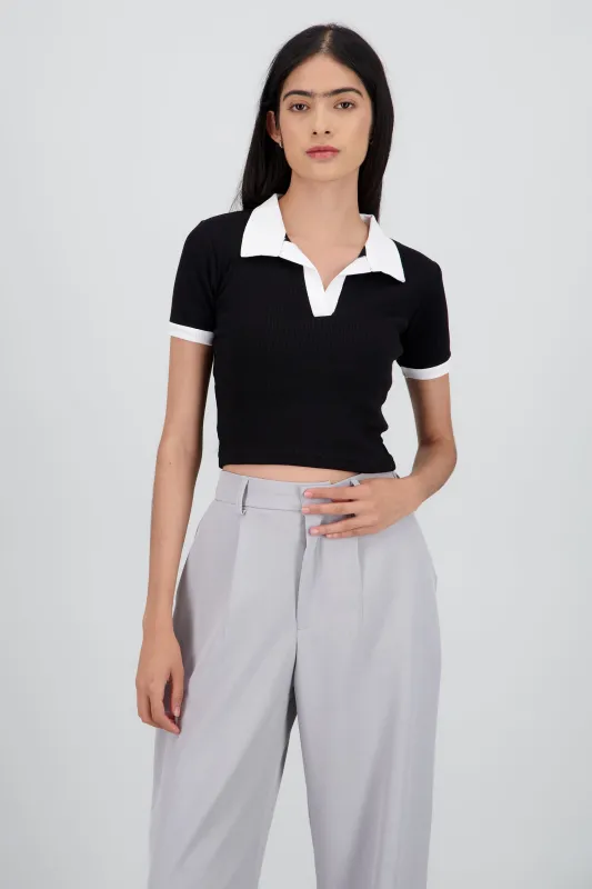 Top cuello polo contraste en mangas sold by Shasa