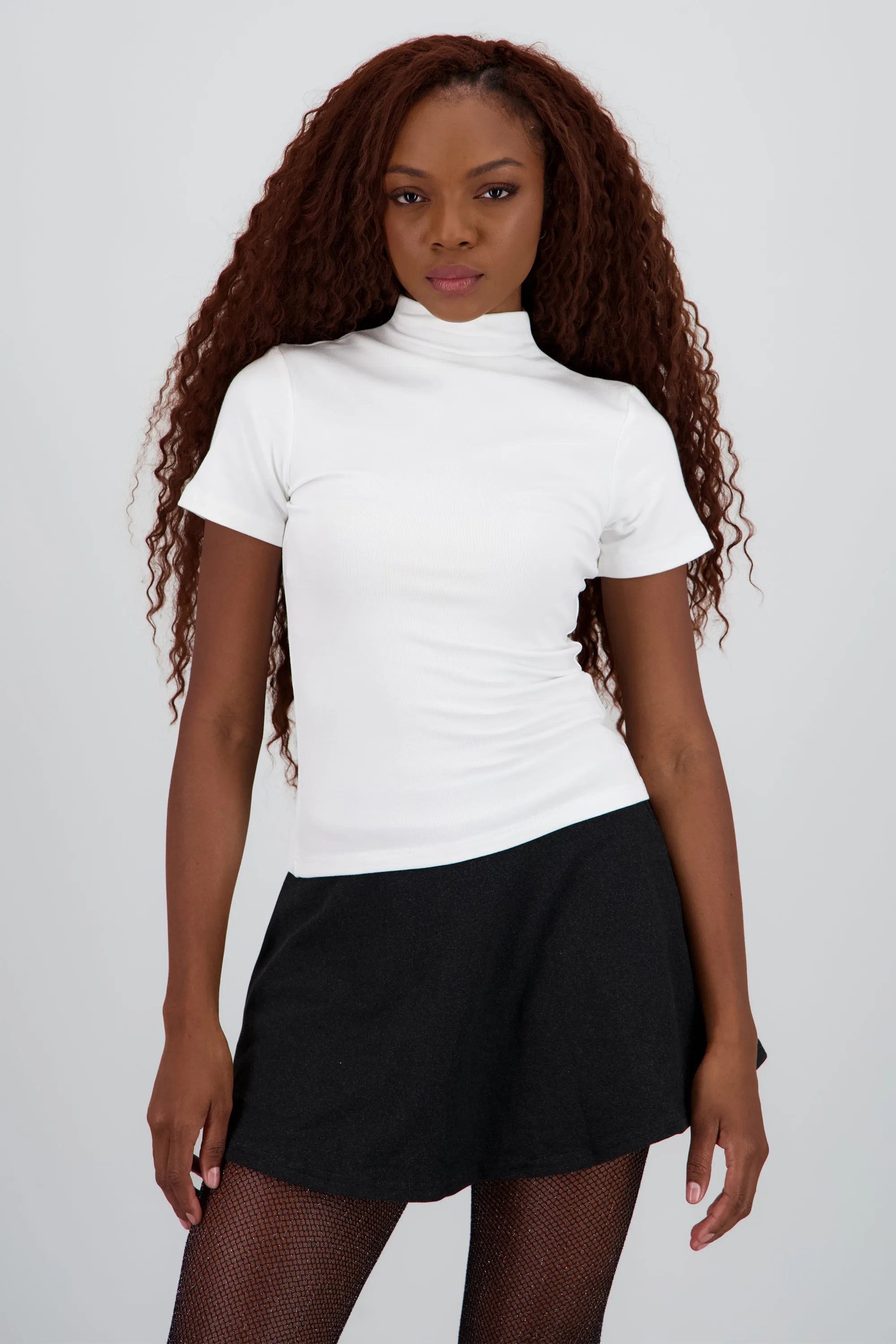 Top manga corta liso cuello alto sold by Shasa