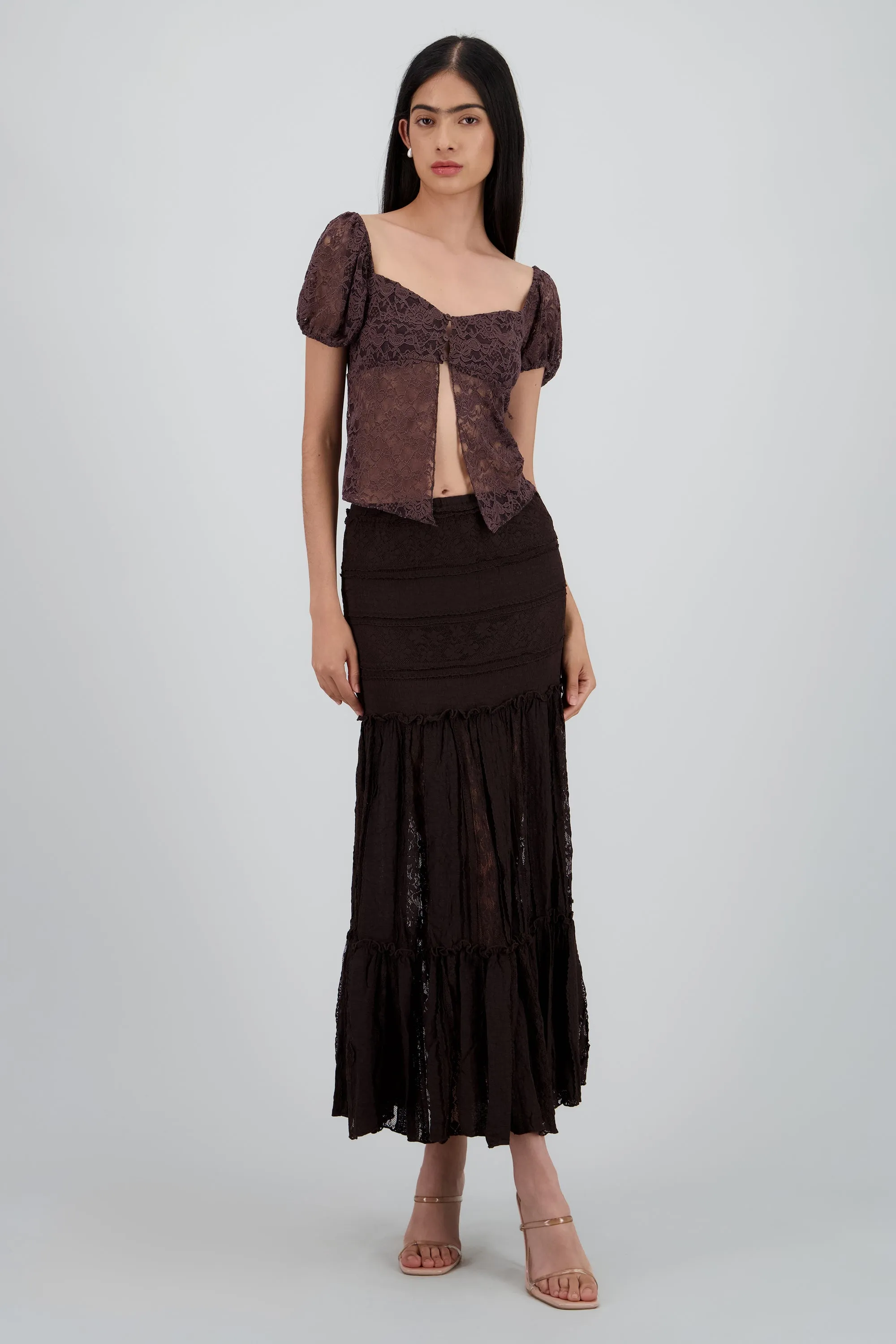 FALDA MIDI TEXTURA sold by Shasa