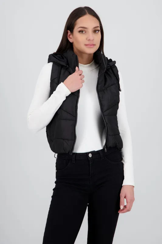 Chaleco capitonado con gorro sold by Shasa