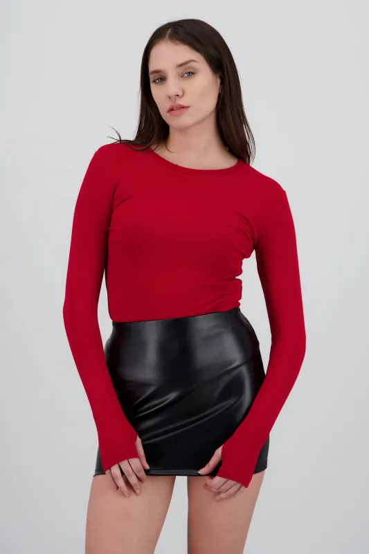 Top manga larga liso cuello redondo sold by Shasa