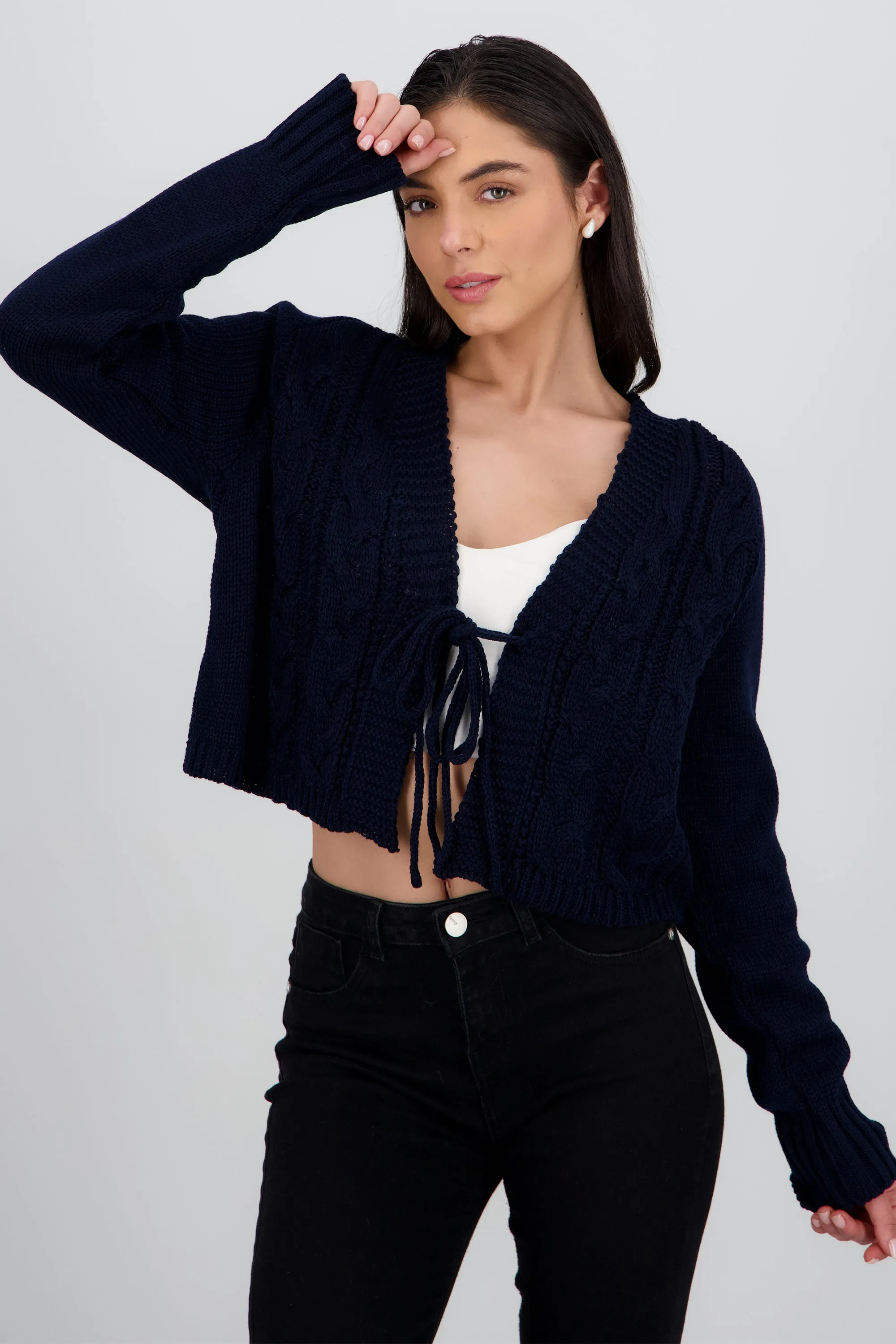 Cardigan trenzado detalle lazo sold by Shasa