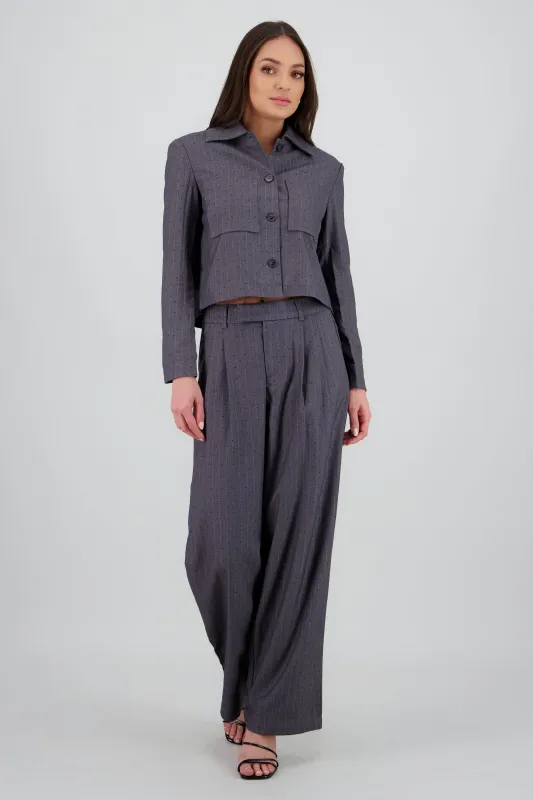 Pantalon amplio liso detalle tela sold by Shasa