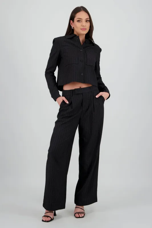 Pantalon amplio liso detalle tela sold by Shasa