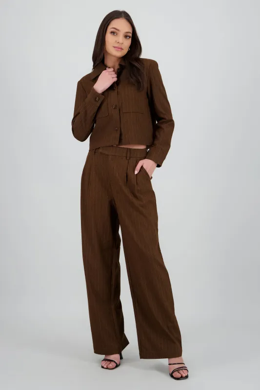 Pantalon amplio liso detalle tela sold by Shasa