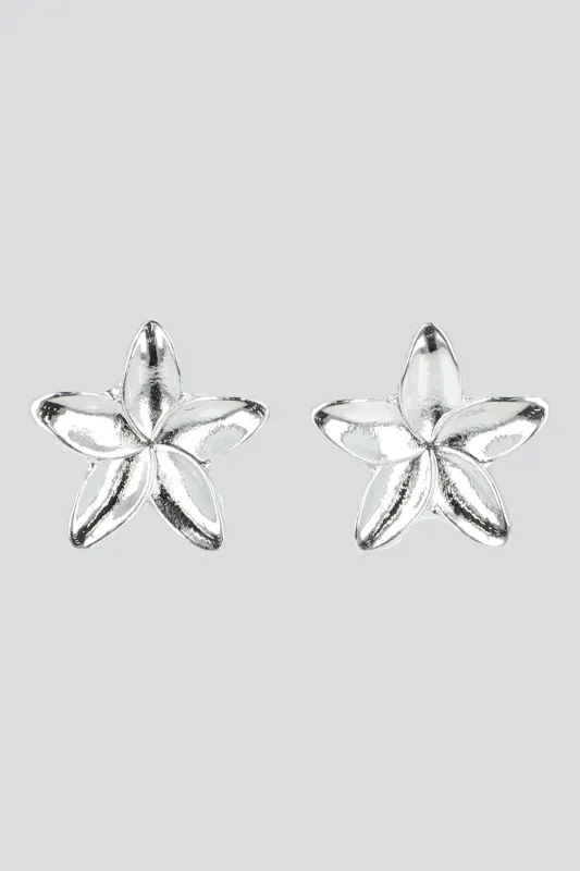 Aretes flor metal sold by Shasa