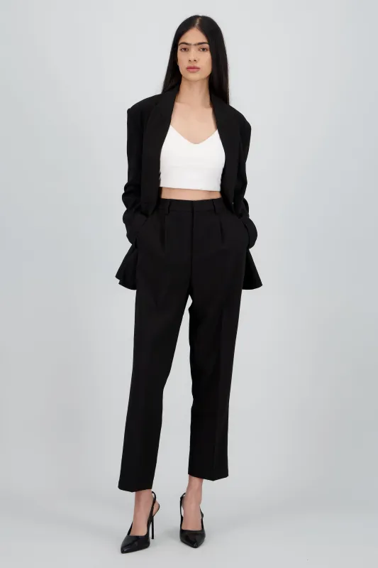 Pantalon sastreado liso sold by Shasa