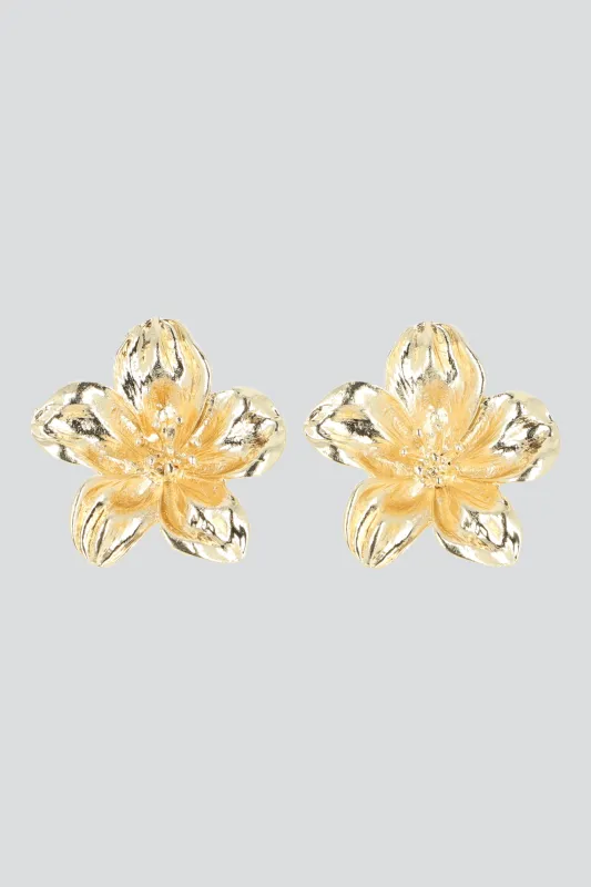 Aretes flor metalicas sold by Shasa