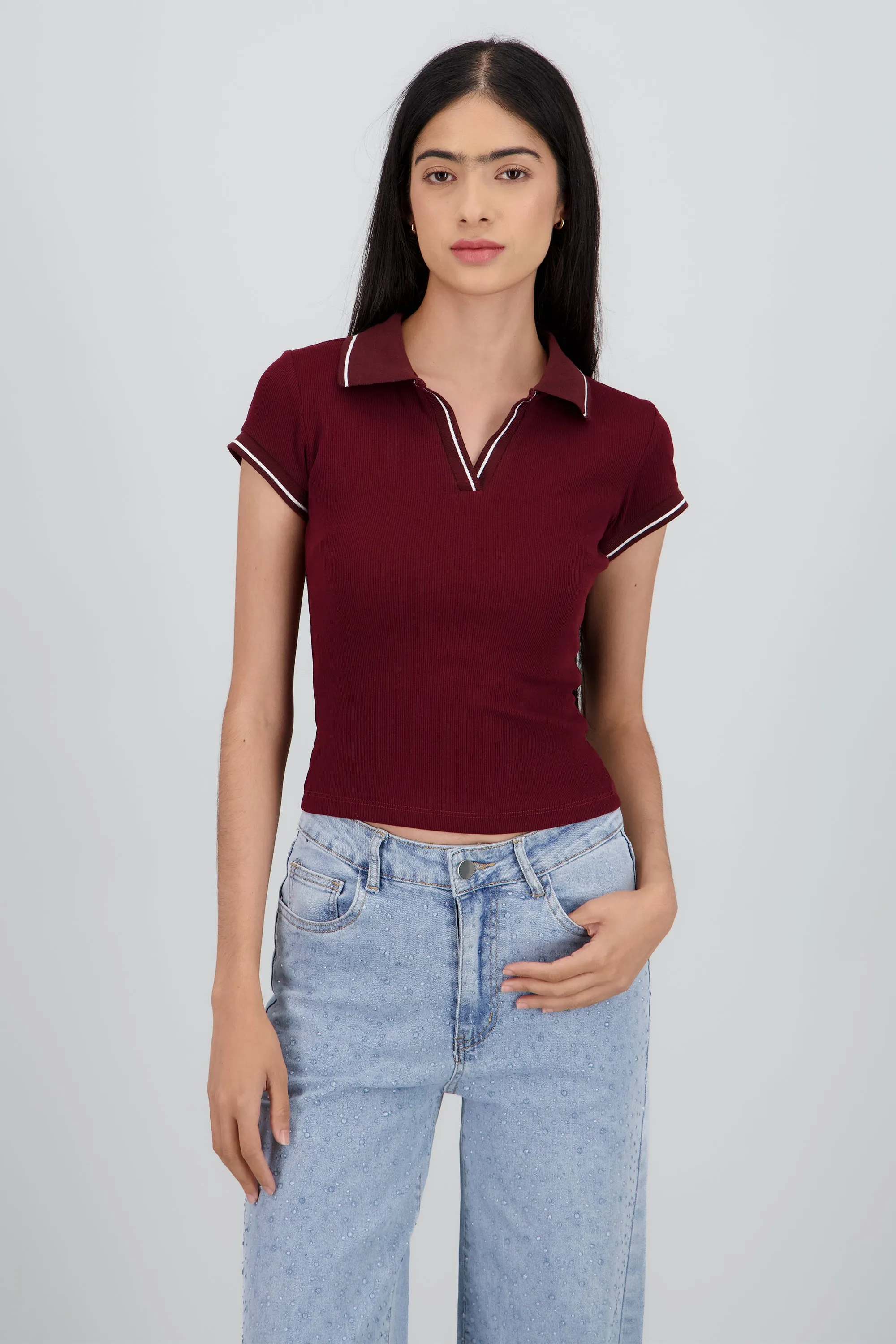 Top cuello polo sold by Shasa