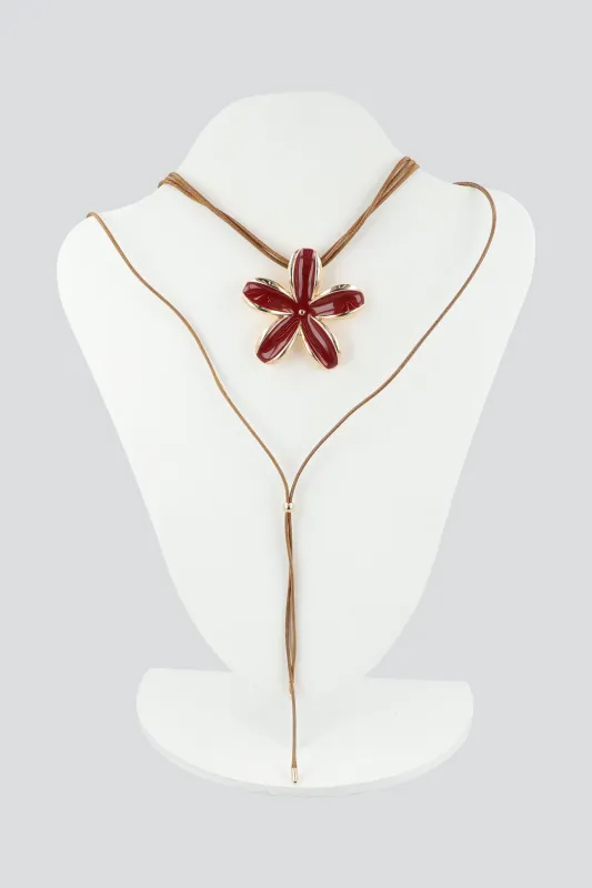COLLAR TIRA SUEDE FLOR METALICA sold by Shasa