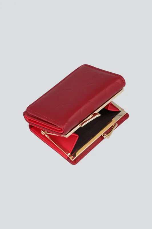 Cartera pequeña textura corazones sold by Shasa