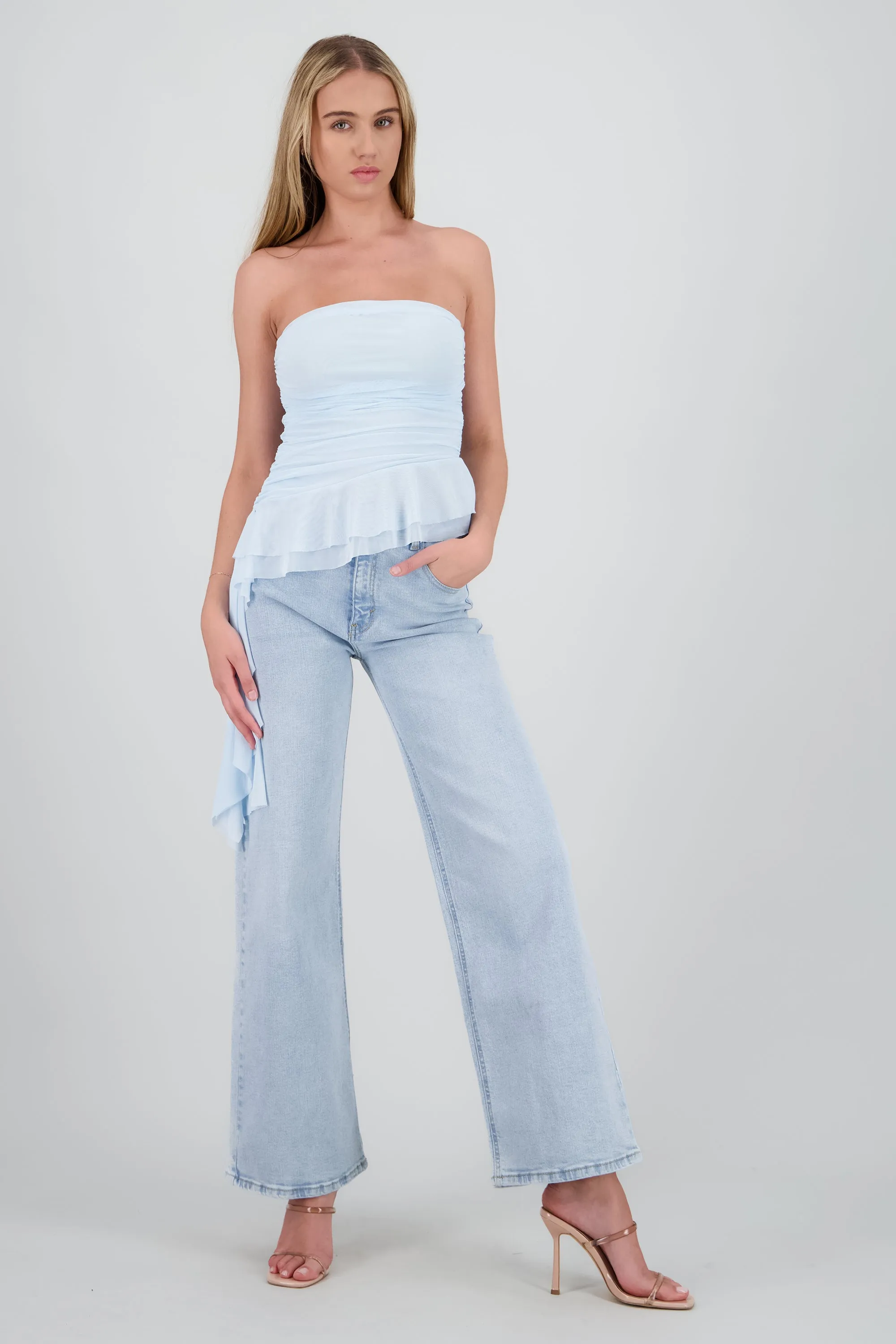 Top strapless olan en costado sold by Shasa