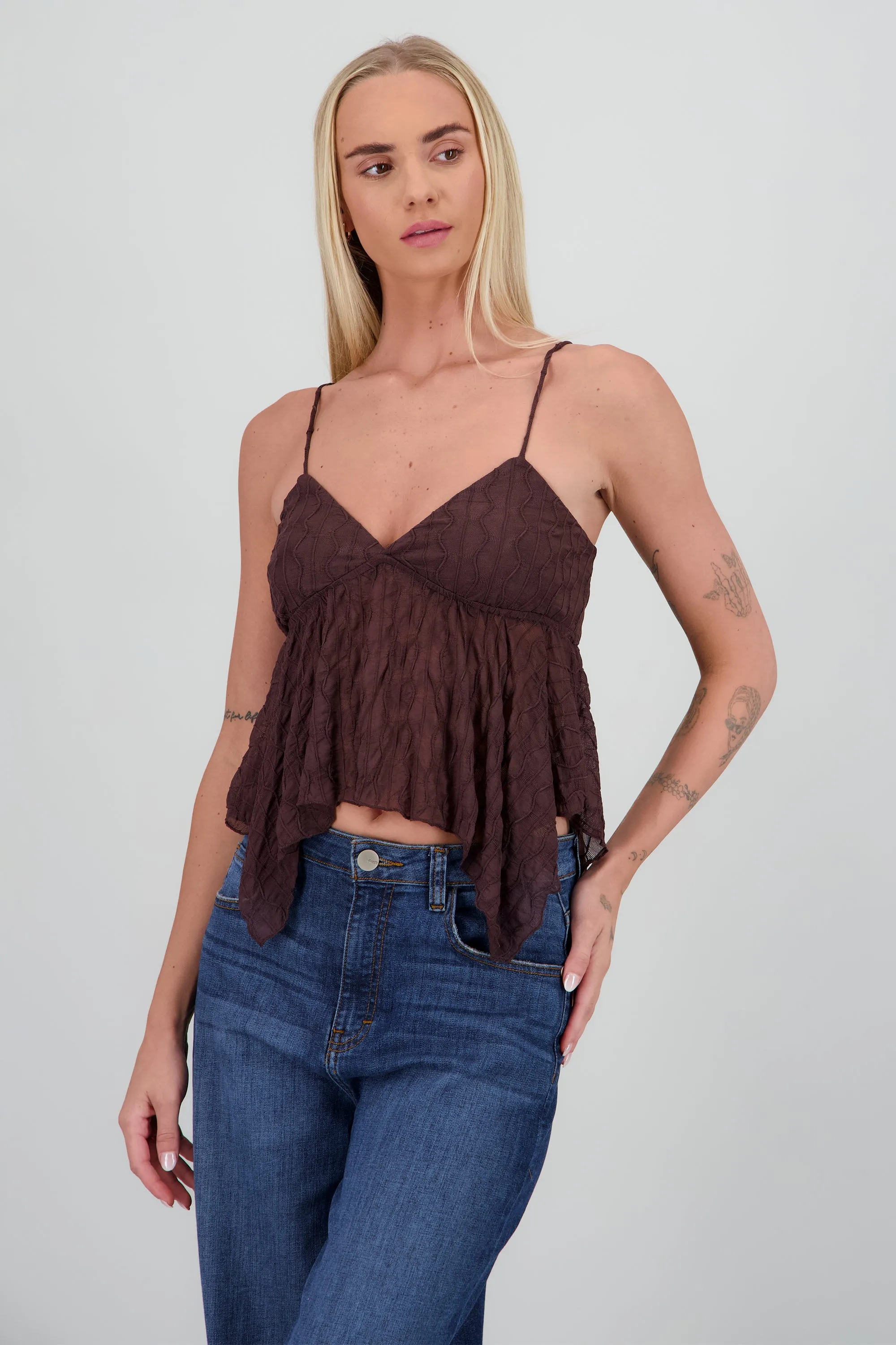 Top encaje asimetrico sold by Shasa