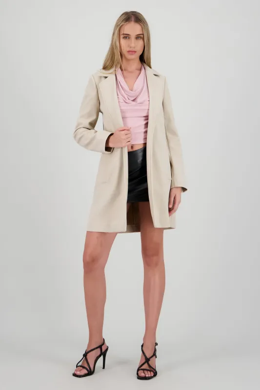 Abrigo largo con bolsas a los costados sold by Shasa