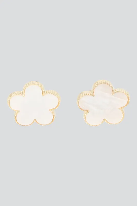 Aretes florecita color sold by Shasa